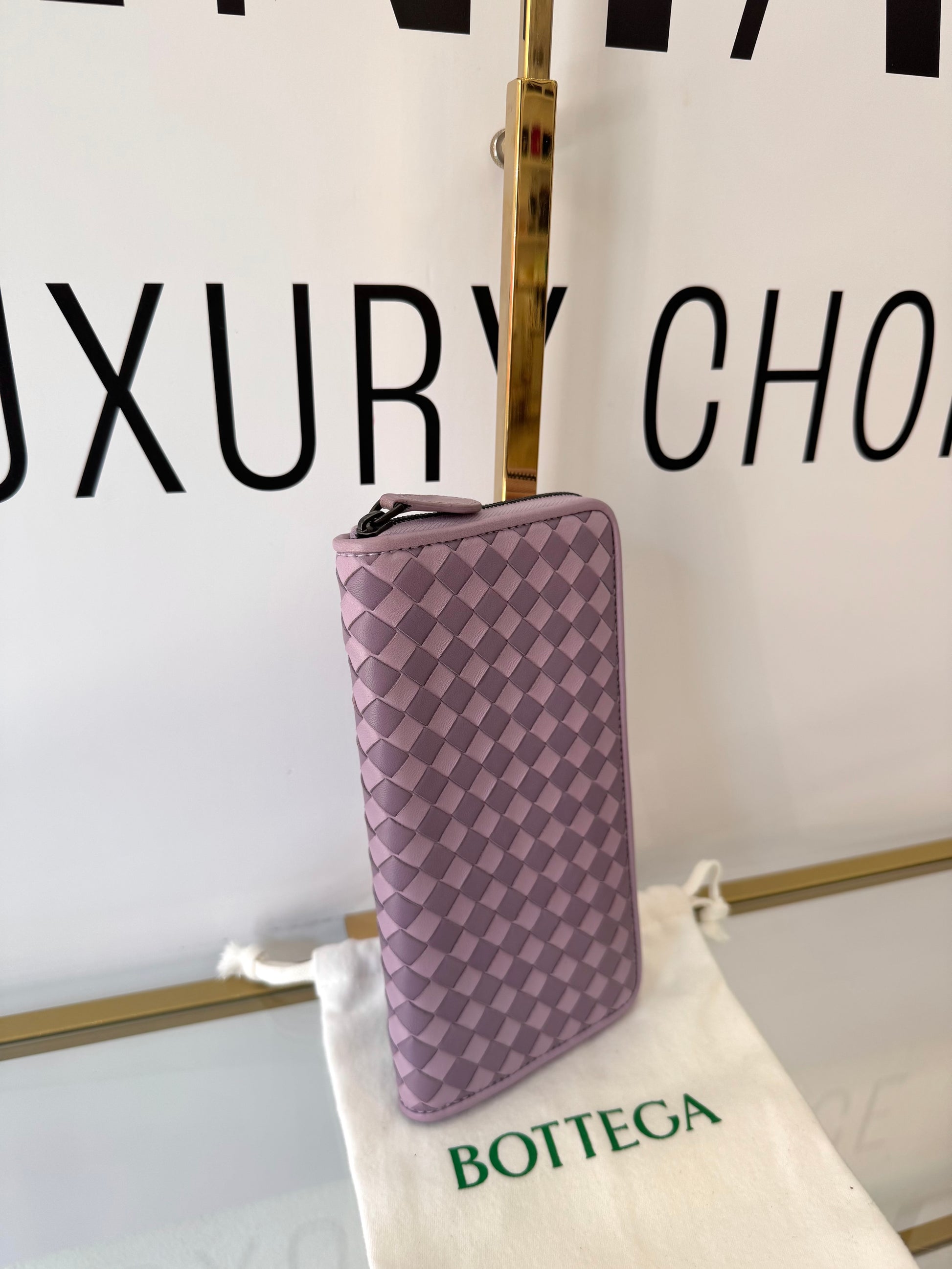 Portafoglio con zip viola Bottega Veneta