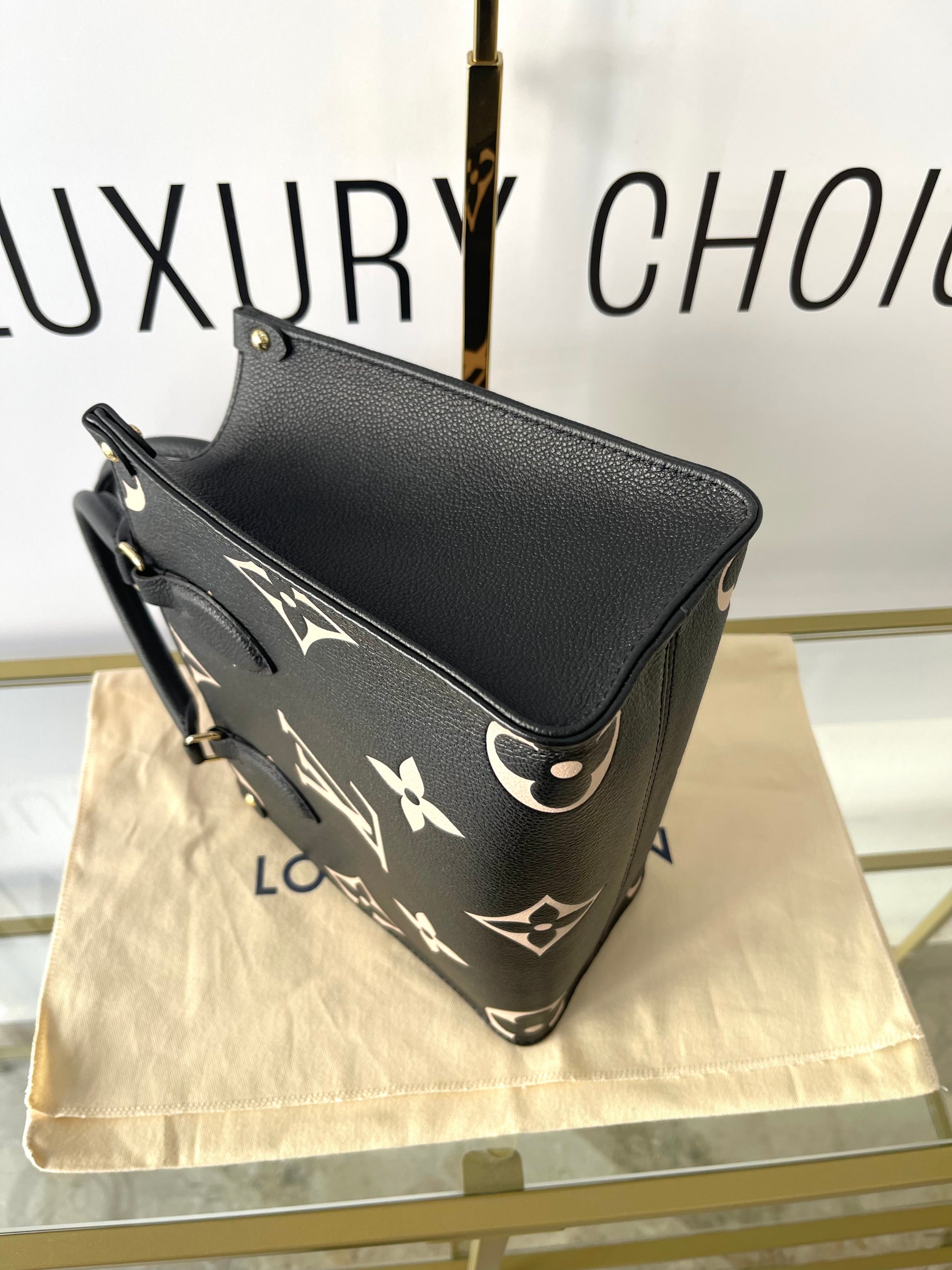 Borsa OnTheGo PM Monogram Empreinte Bicolor Louis Vuitton