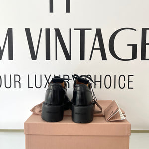 Scarpe stringate in pelle Miu Miu