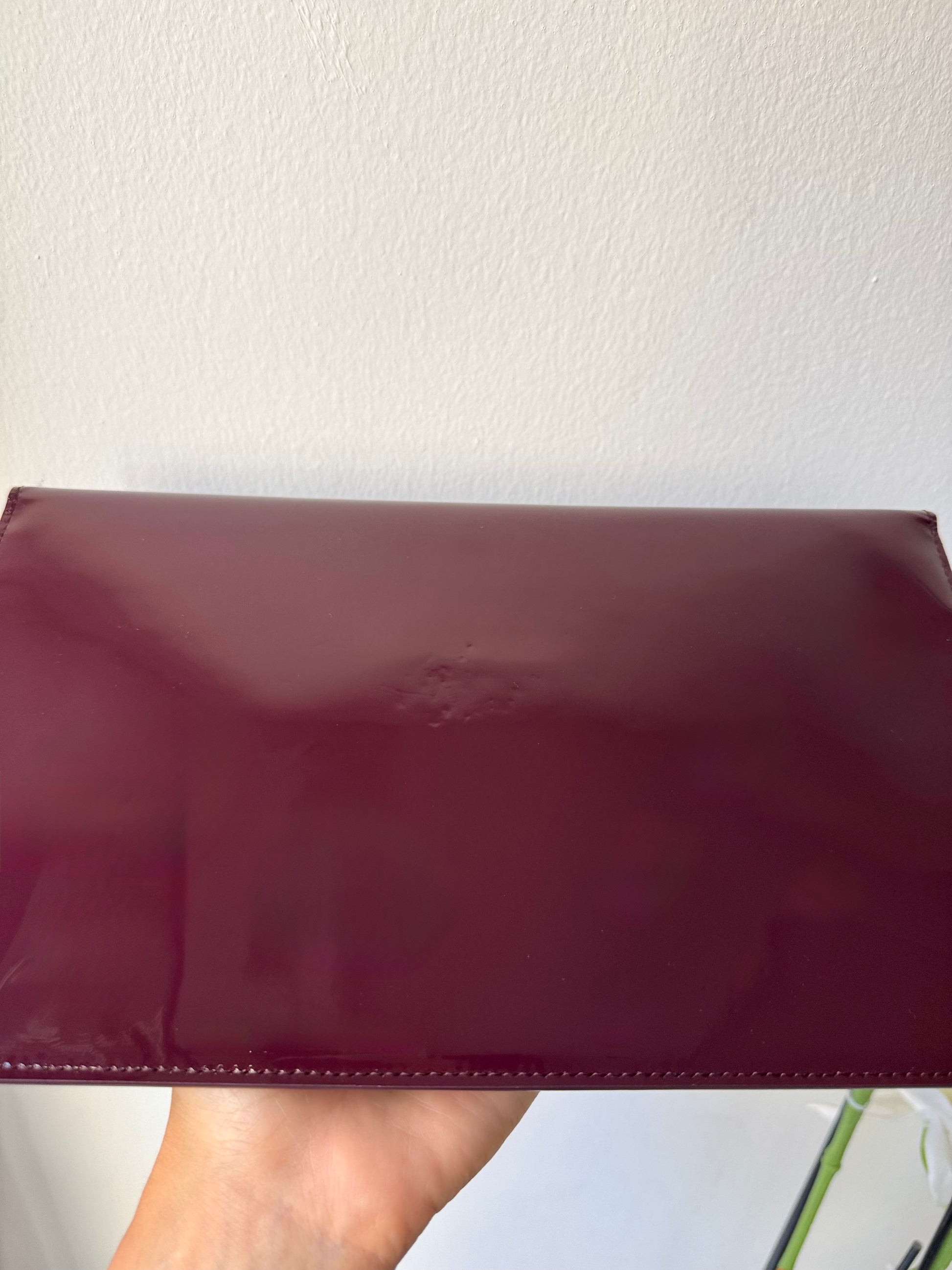 Pochette Uptown in pelle verniciata Saint Laurent