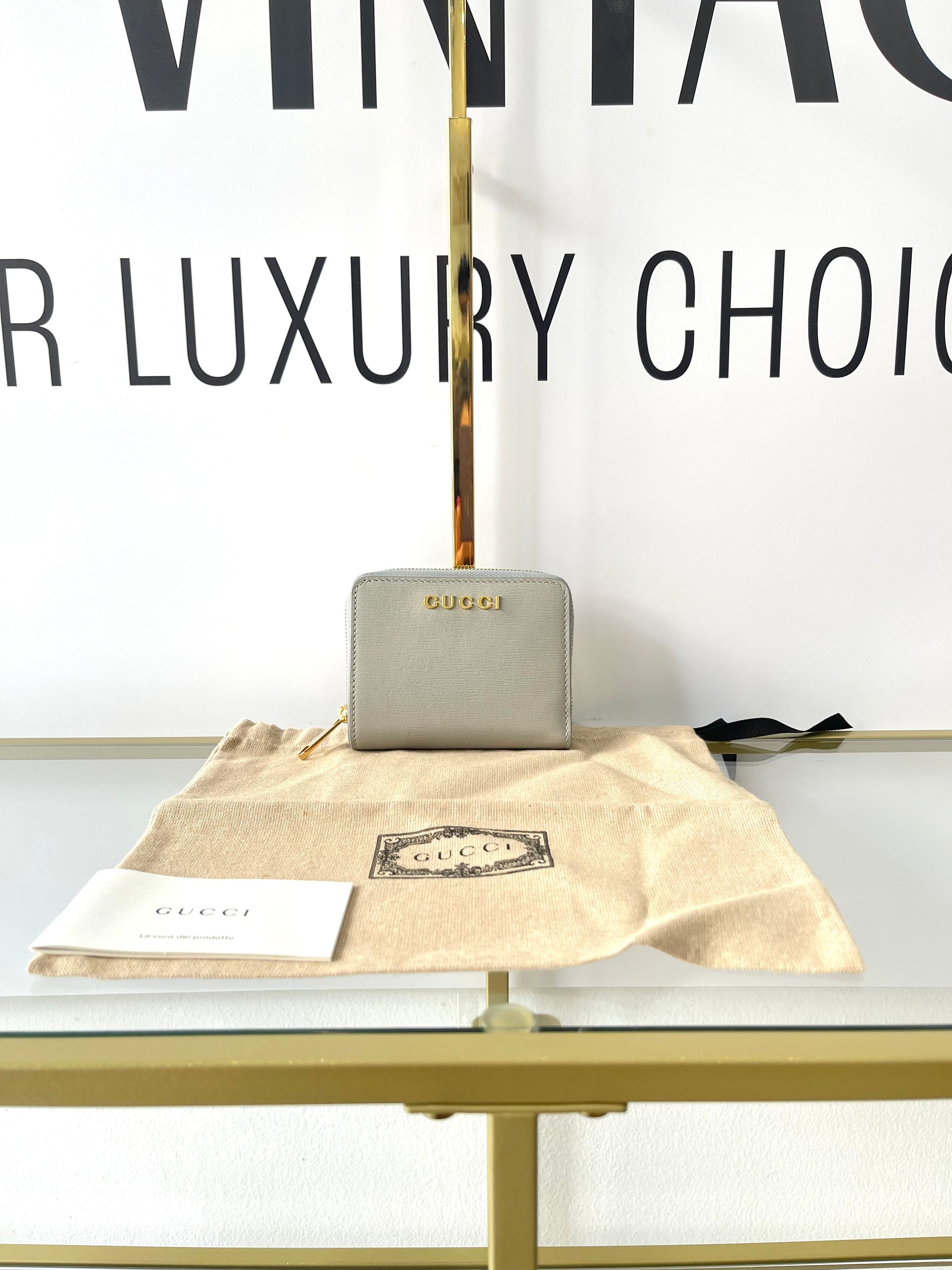 Portafoglio con logo Gucci grigio chiaro