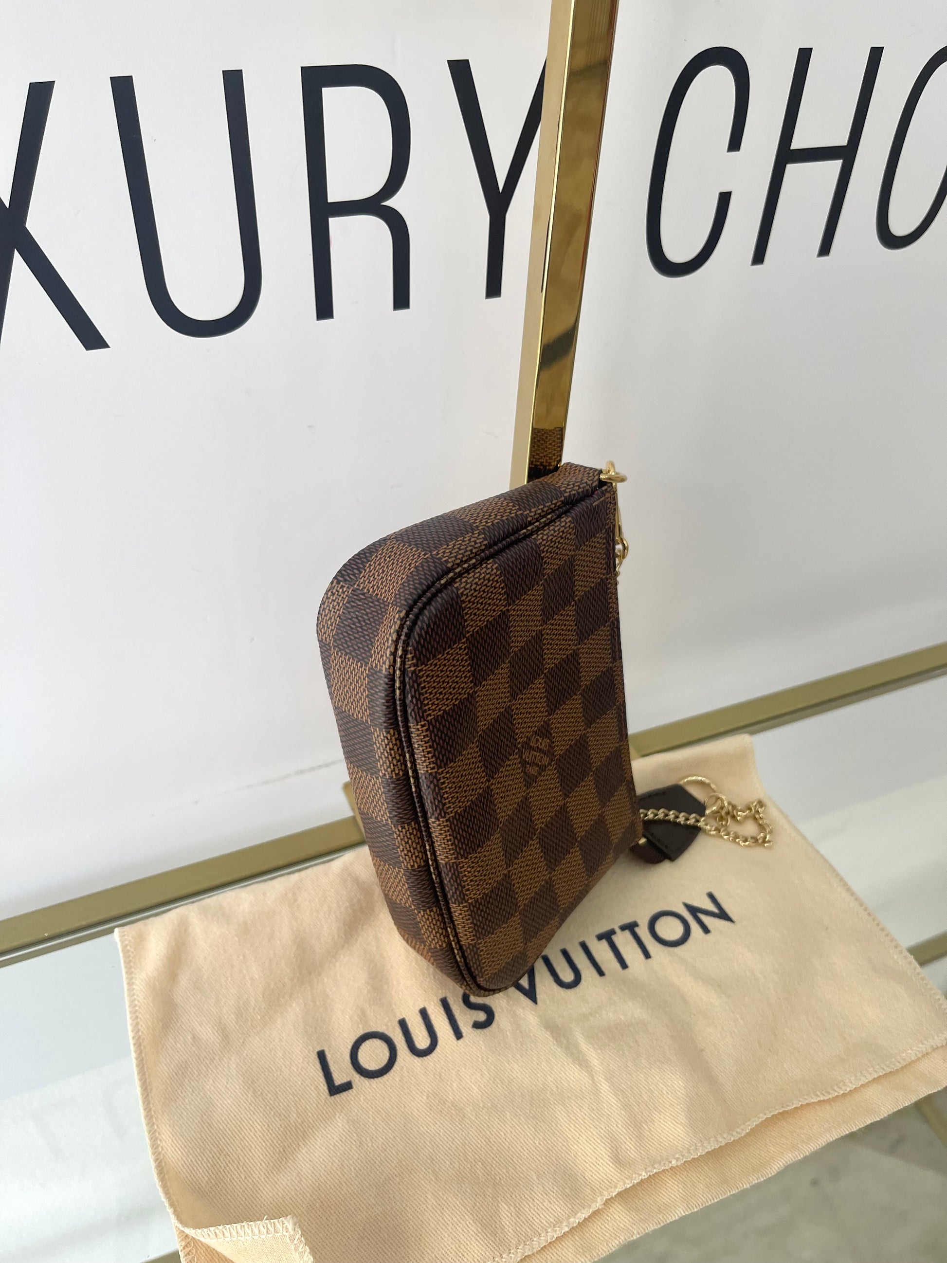 Borsa Mini Pochette Accessoires Damier Ebène Louis Vuitton