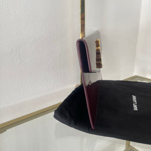 Pochette Uptown in pelle verniciata Saint Laurent