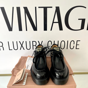 Scarpe stringate in pelle Miu Miu