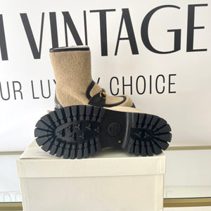 Stivaletti con dettaglio Ape e morsetto Gucci