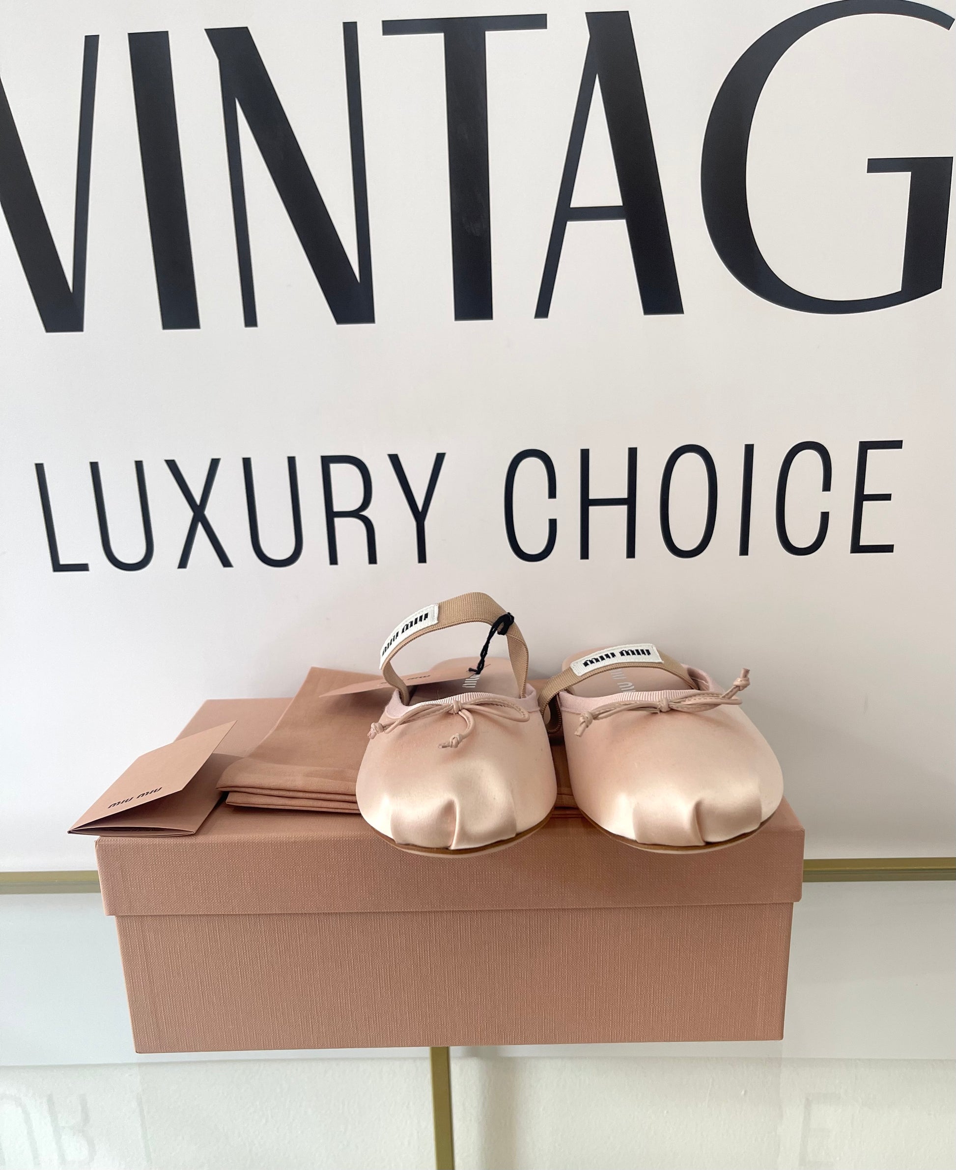 Ballerine in raso Miu Miu