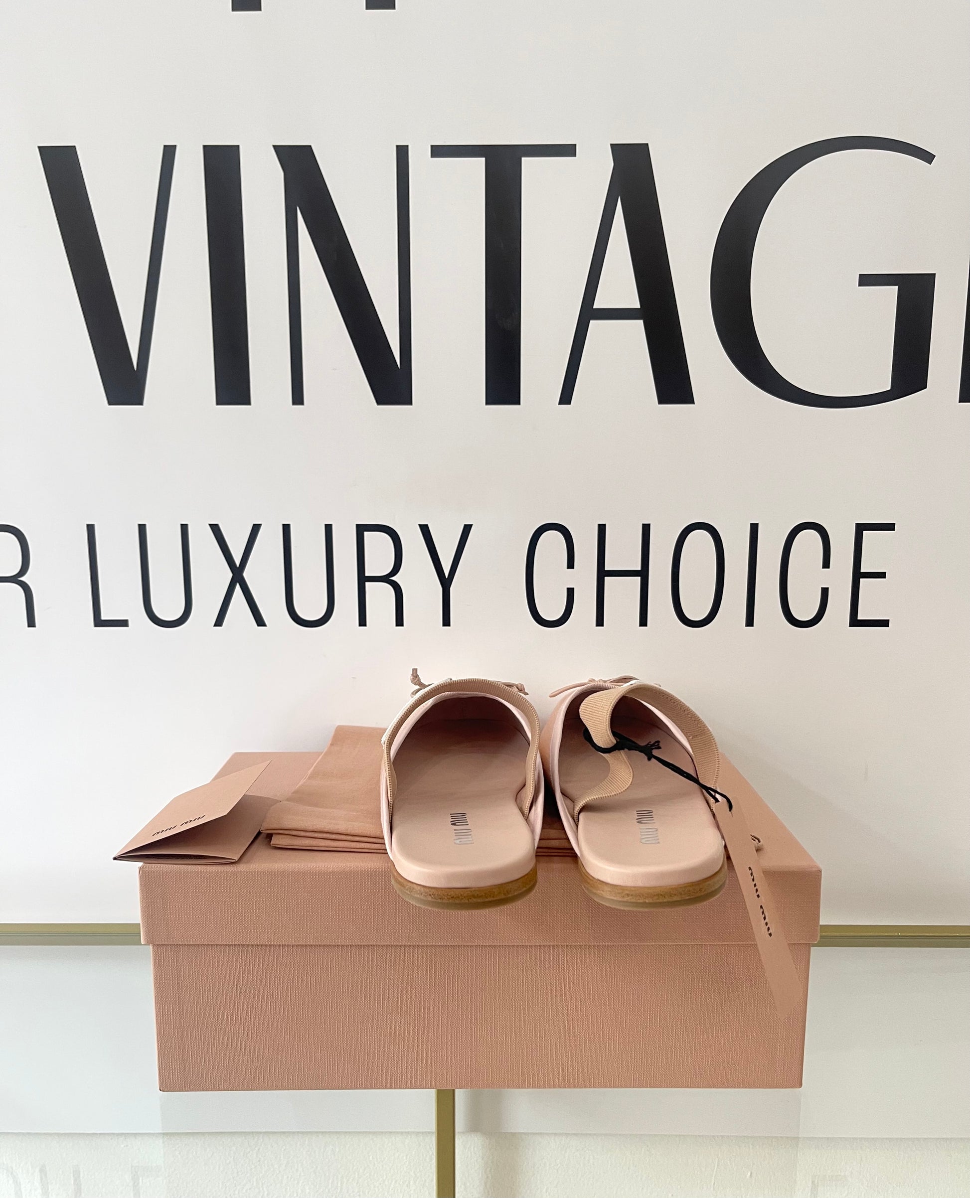 Ballerine in raso Miu Miu