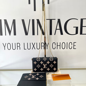 Pochette Félicie Monogram Empreinte Bicolor Louis Vuitton