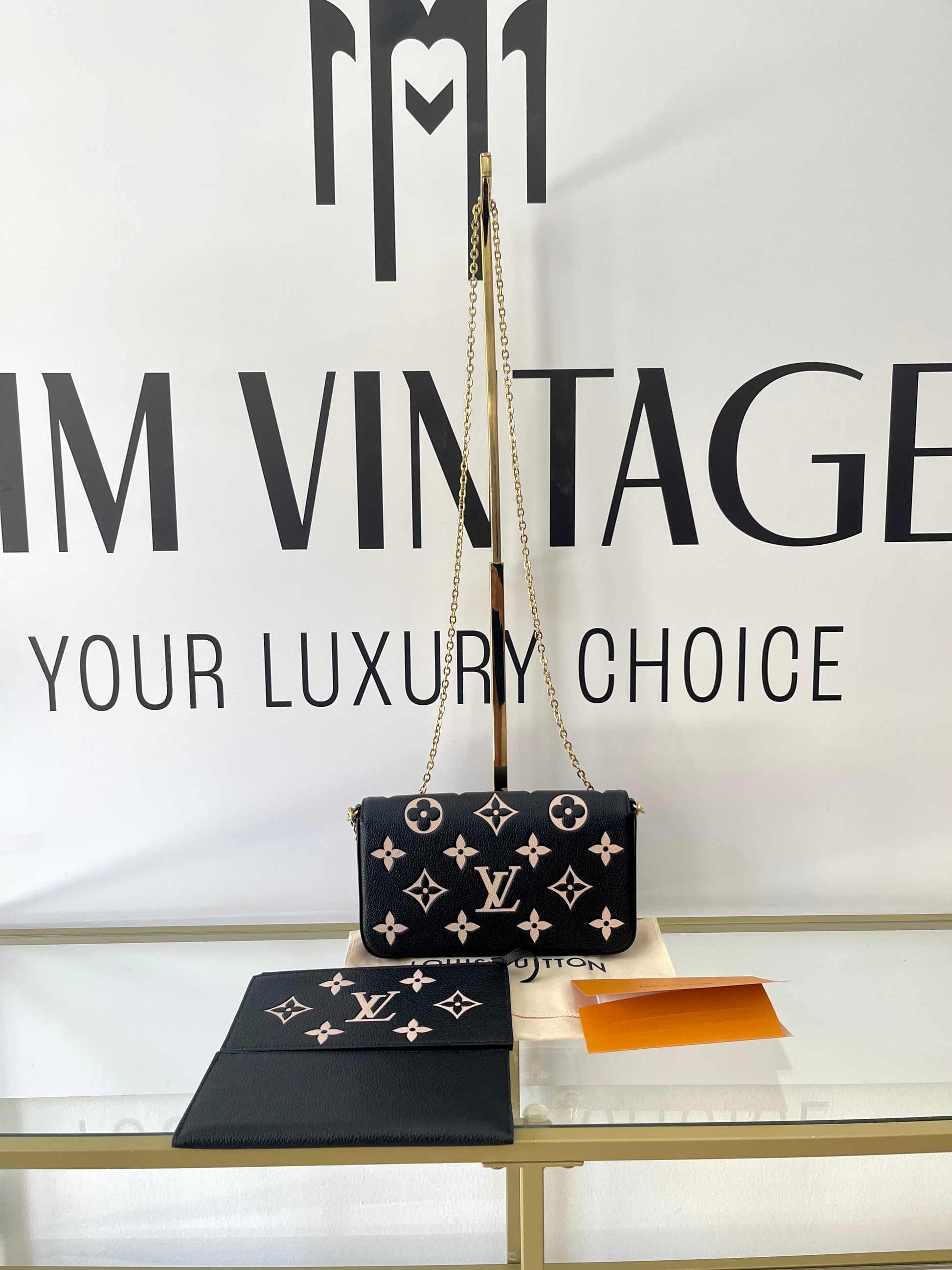 Pochette Félicie Monogram Empreinte Bicolor Louis Vuitton