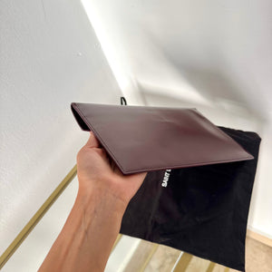 Pochette Uptown in pelle verniciata Saint Laurent