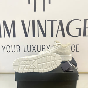 Sneakers donna con shearling Prada