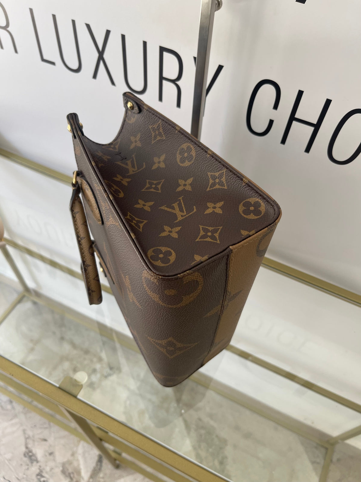 Borsa OnTheGo PM Monogram Reverse Giant Louis Vuitton
