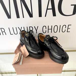 Scarpe stringate in pelle Miu Miu