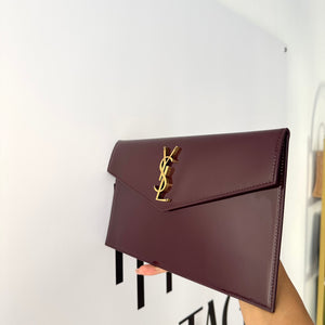 Pochette Uptown in pelle verniciata Saint Laurent