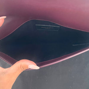 Pochette Uptown in pelle verniciata Saint Laurent