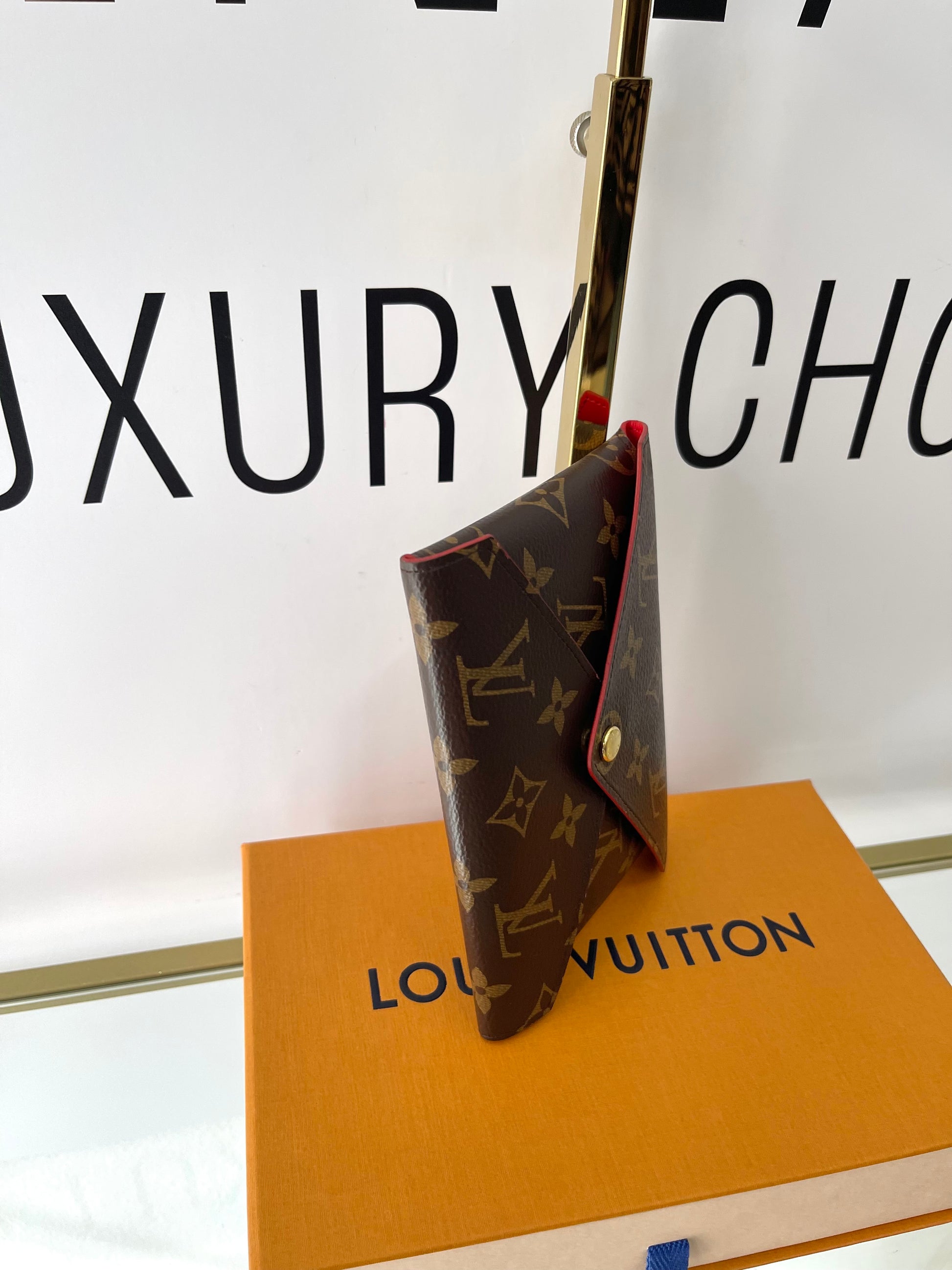 Pochette Kirigami Monogram Medium Louis Vuitton