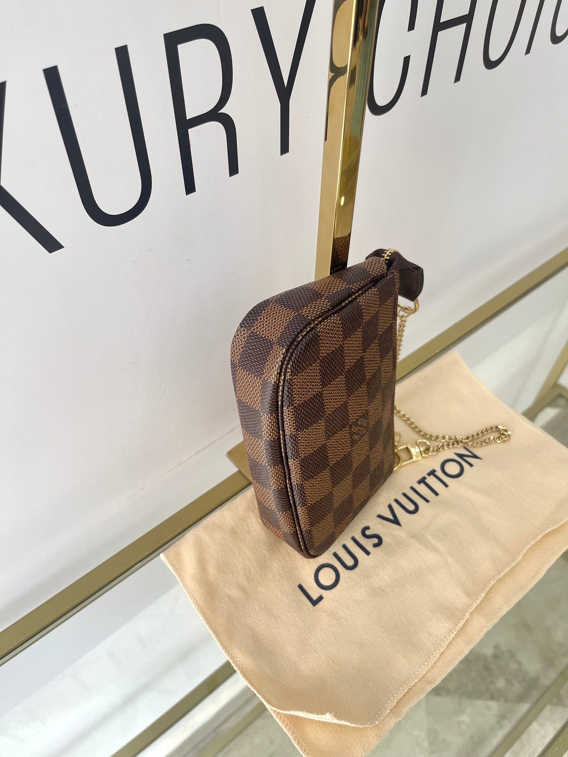 Borsa Mini Pochette Accessoires Damier Ebène Louis Vuitton