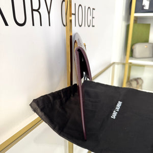Pochette Uptown in pelle verniciata Saint Laurent