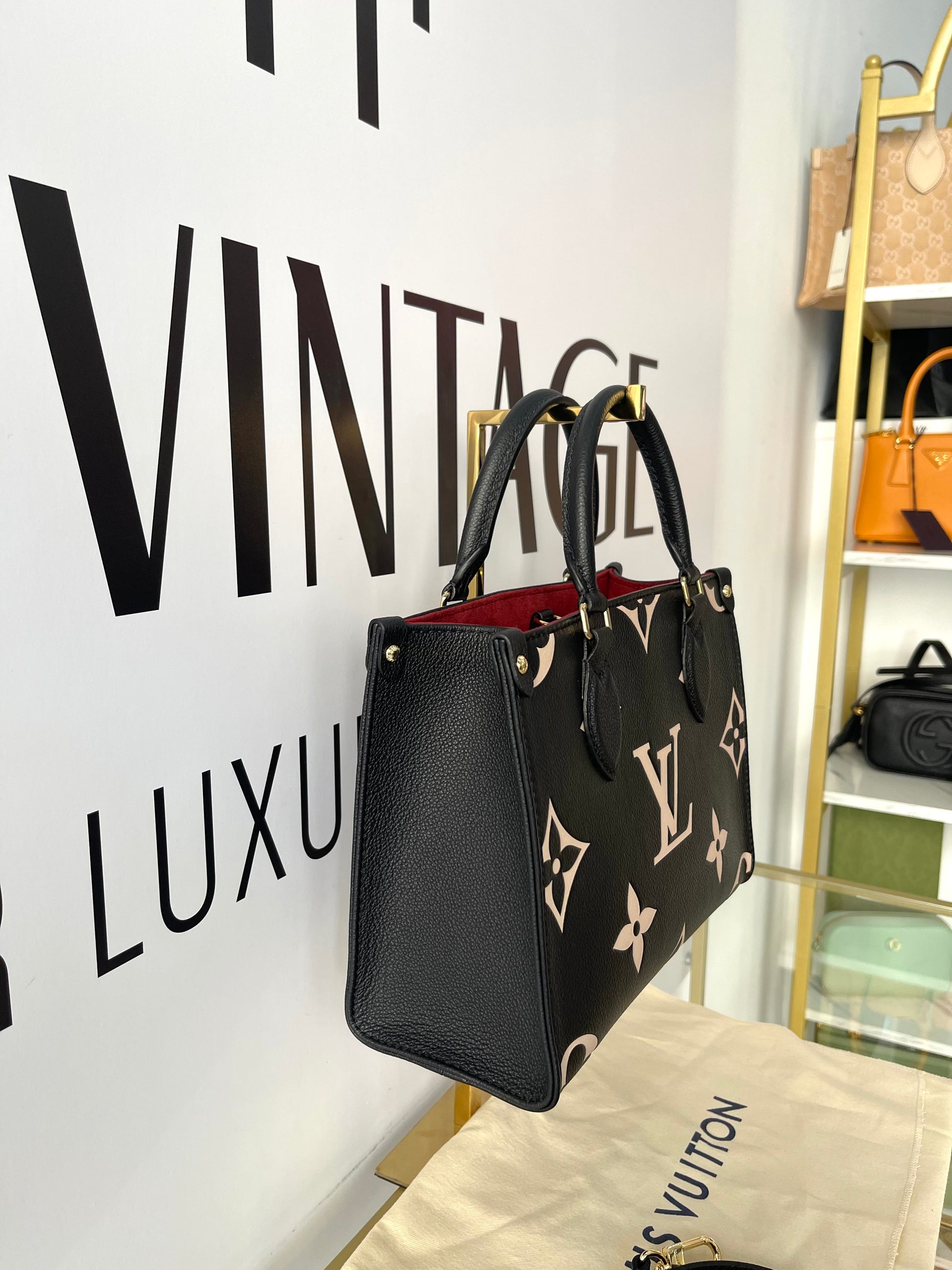 Borsa OnTheGo PM Monogram Empreinte Bicolor Louis Vuitton