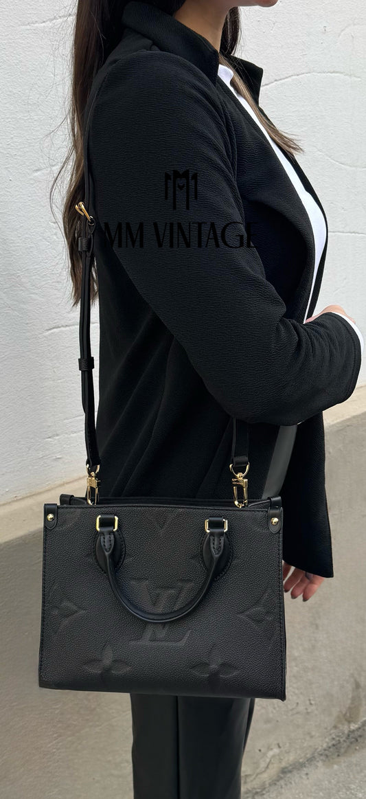 Borsa OnTheGo PM Monogram Empreinte Louis Vuitton