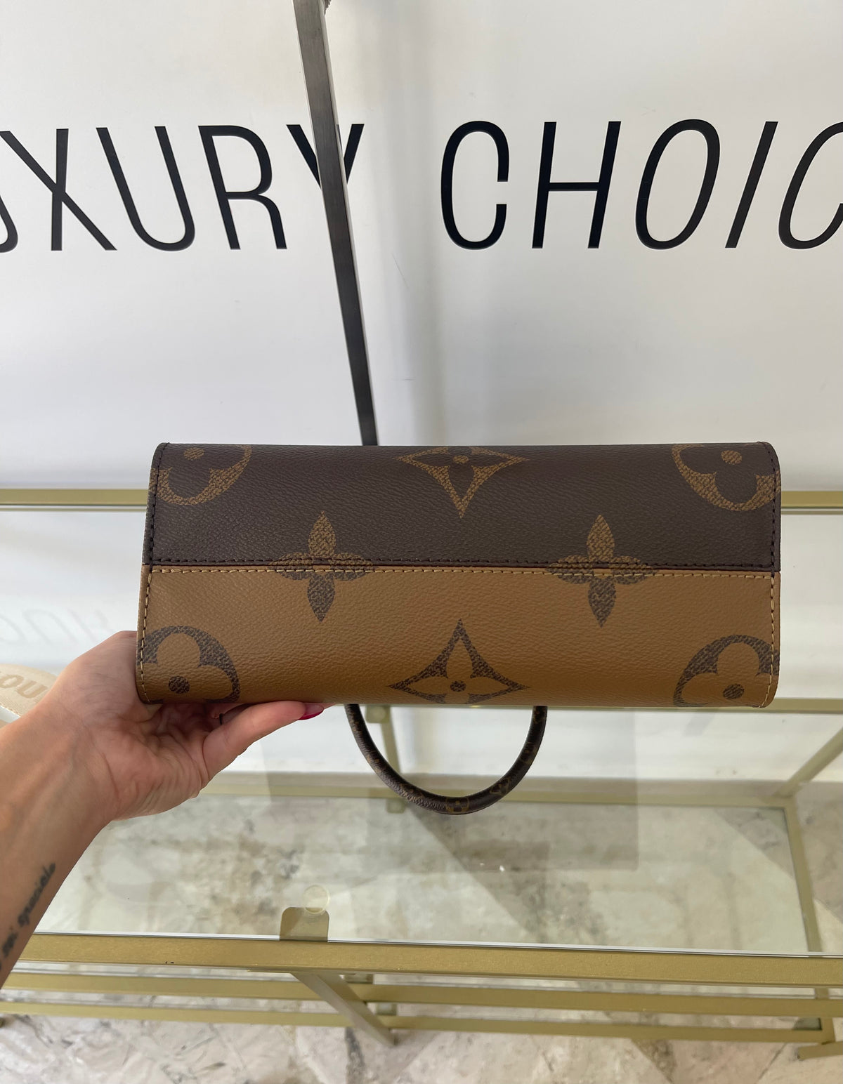 Borsa OnTheGo PM Monogram Reverse Giant Louis Vuitton
