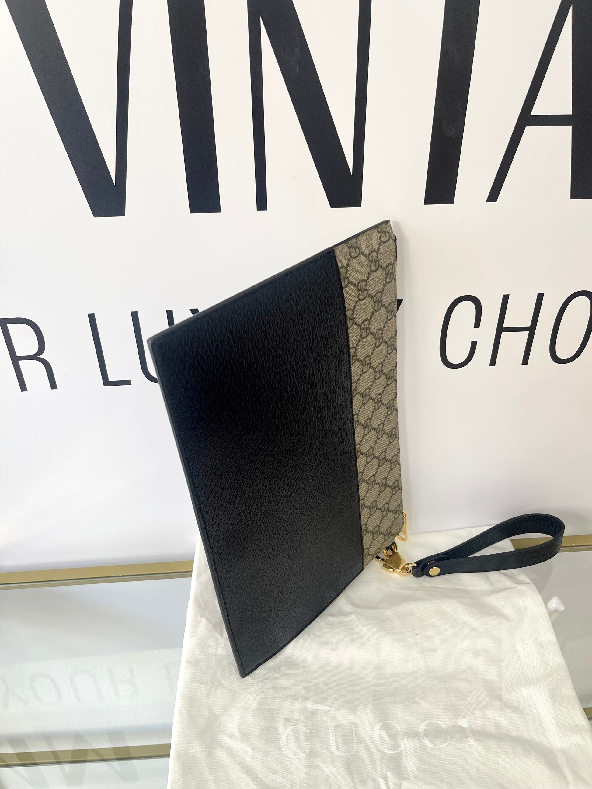 Pochette Interlocking GG Supreme Gucci