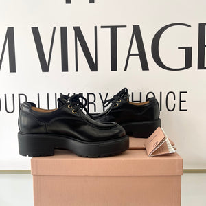 Scarpe stringate in pelle Miu Miu