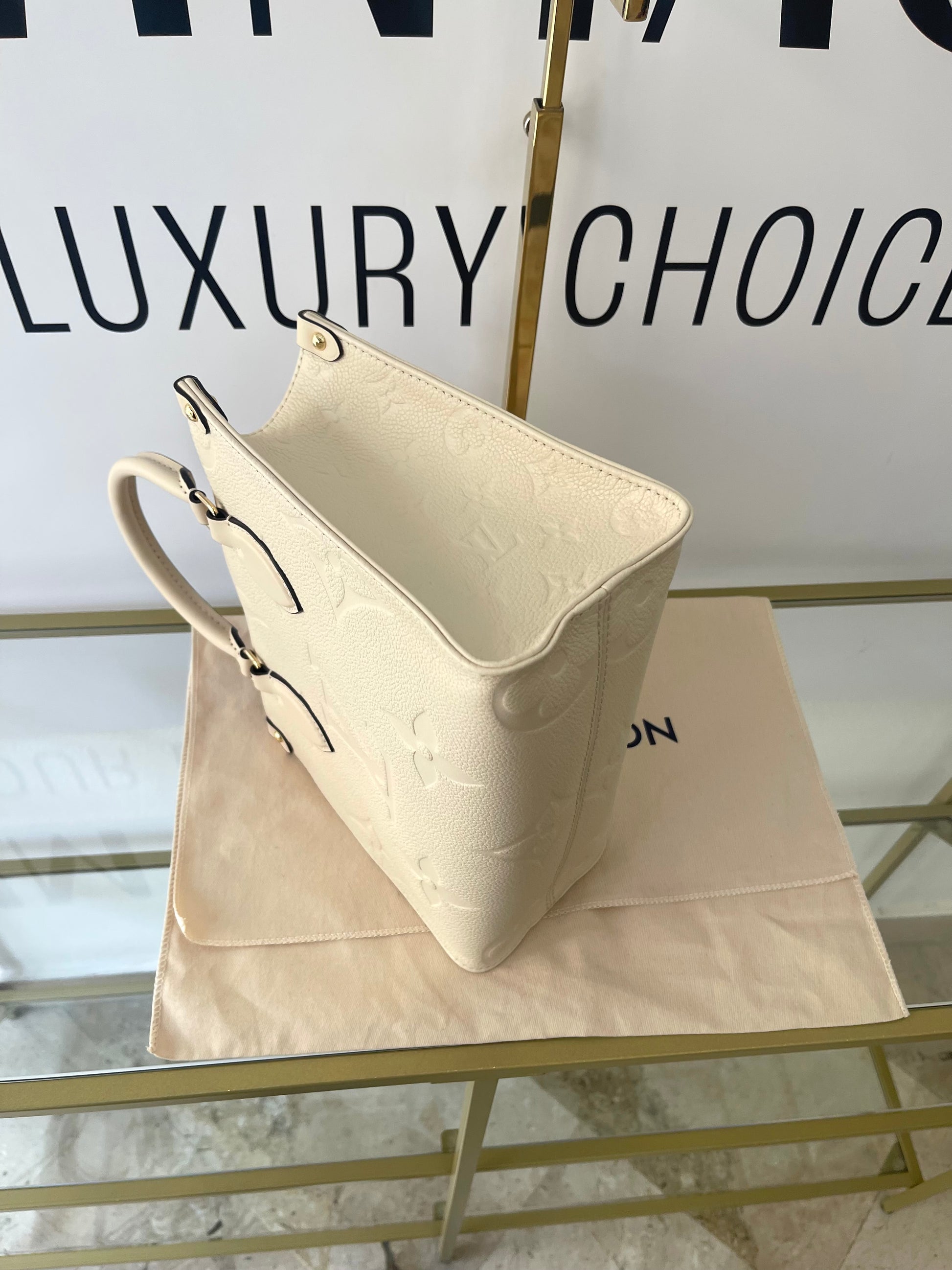 Borsa OnTheGo PM Monogram Empreinte Louis Vuitton