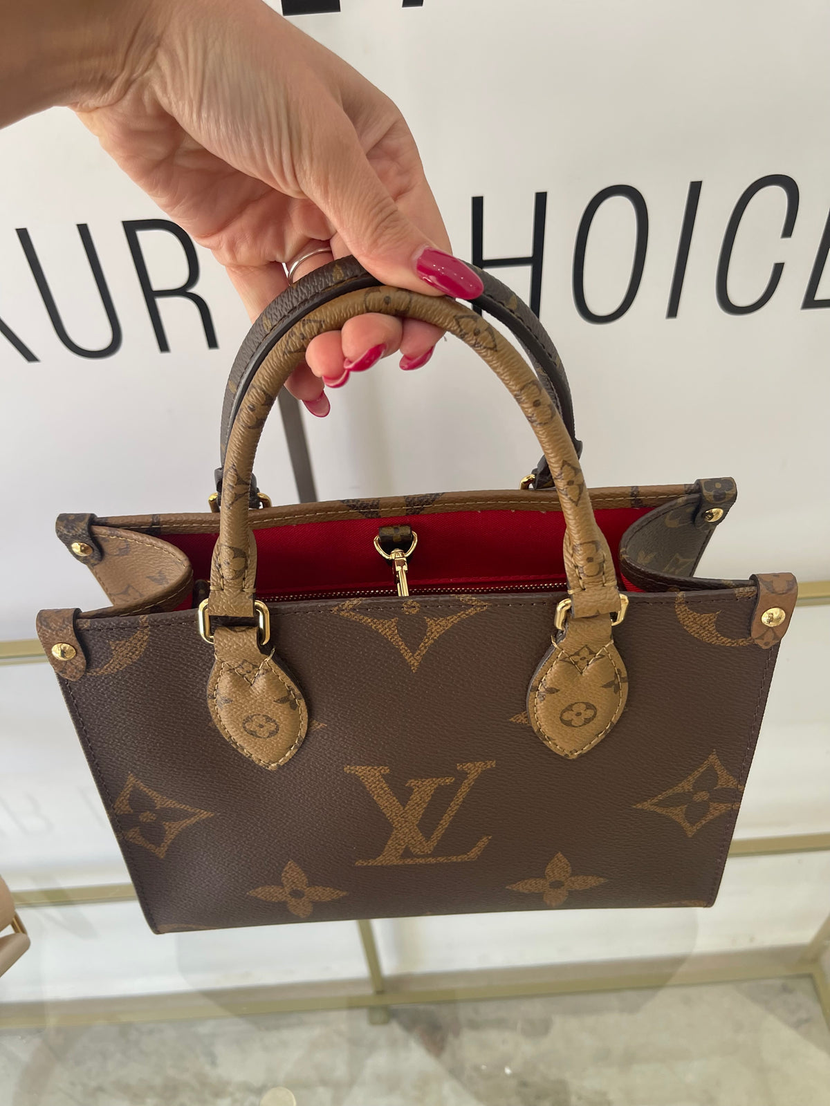 Borsa OnTheGo PM Monogram Reverse Giant Louis Vuitton