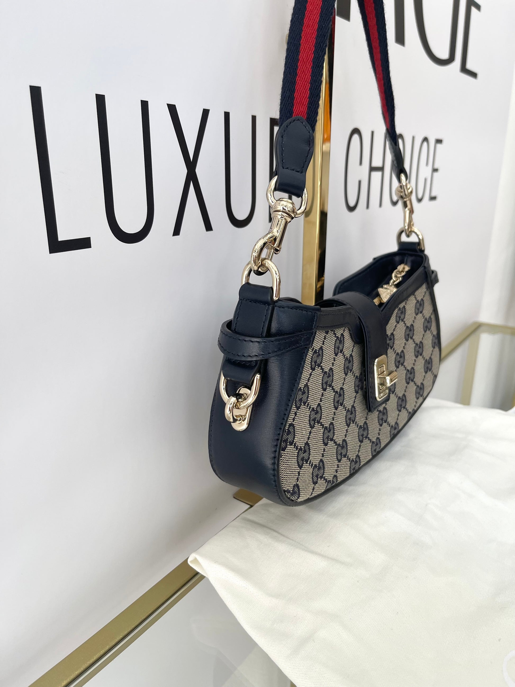 Borsa Moon Side GG Supreme Gucci