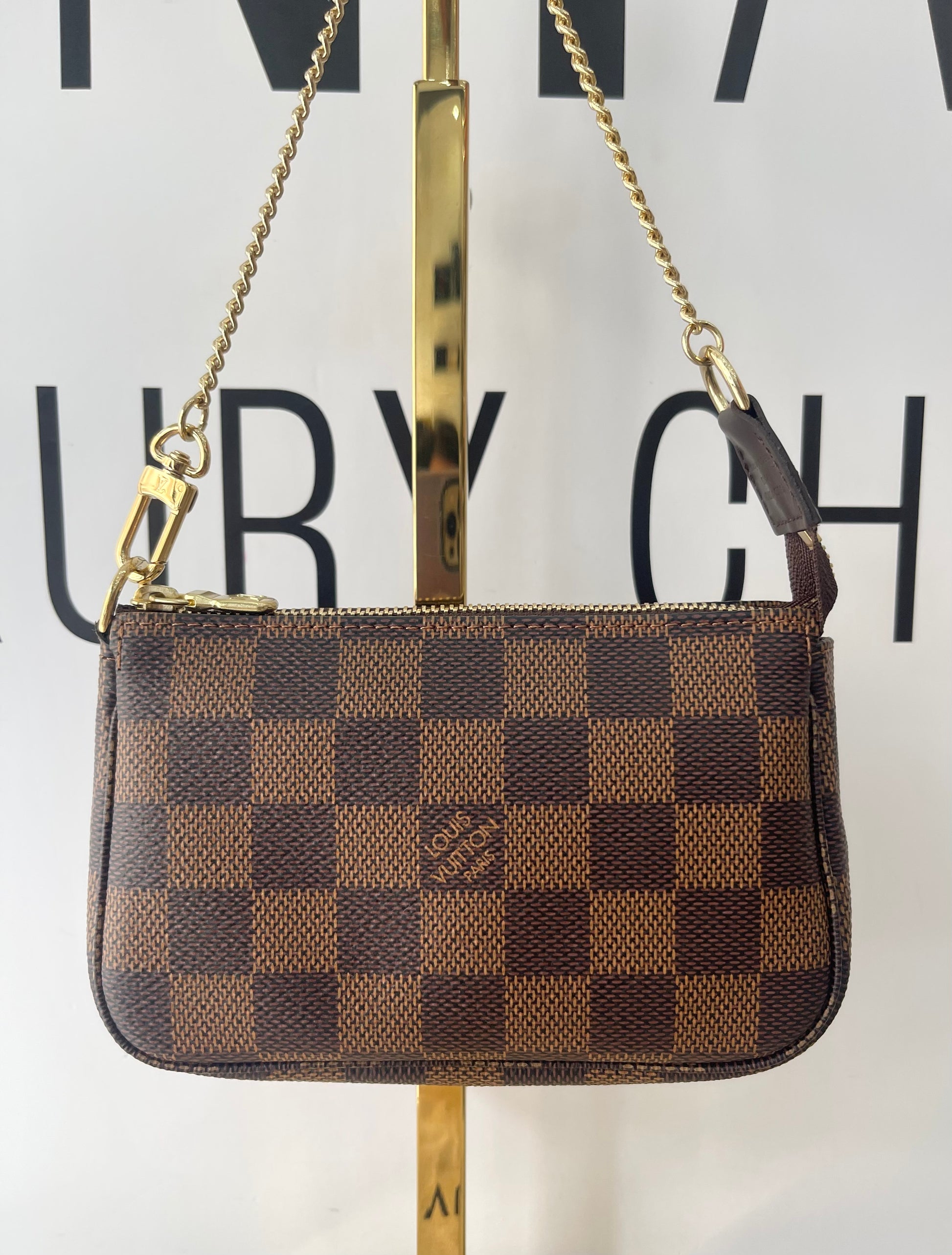 Borsa Mini Pochette Accessoires Damier Ebène Louis Vuitton