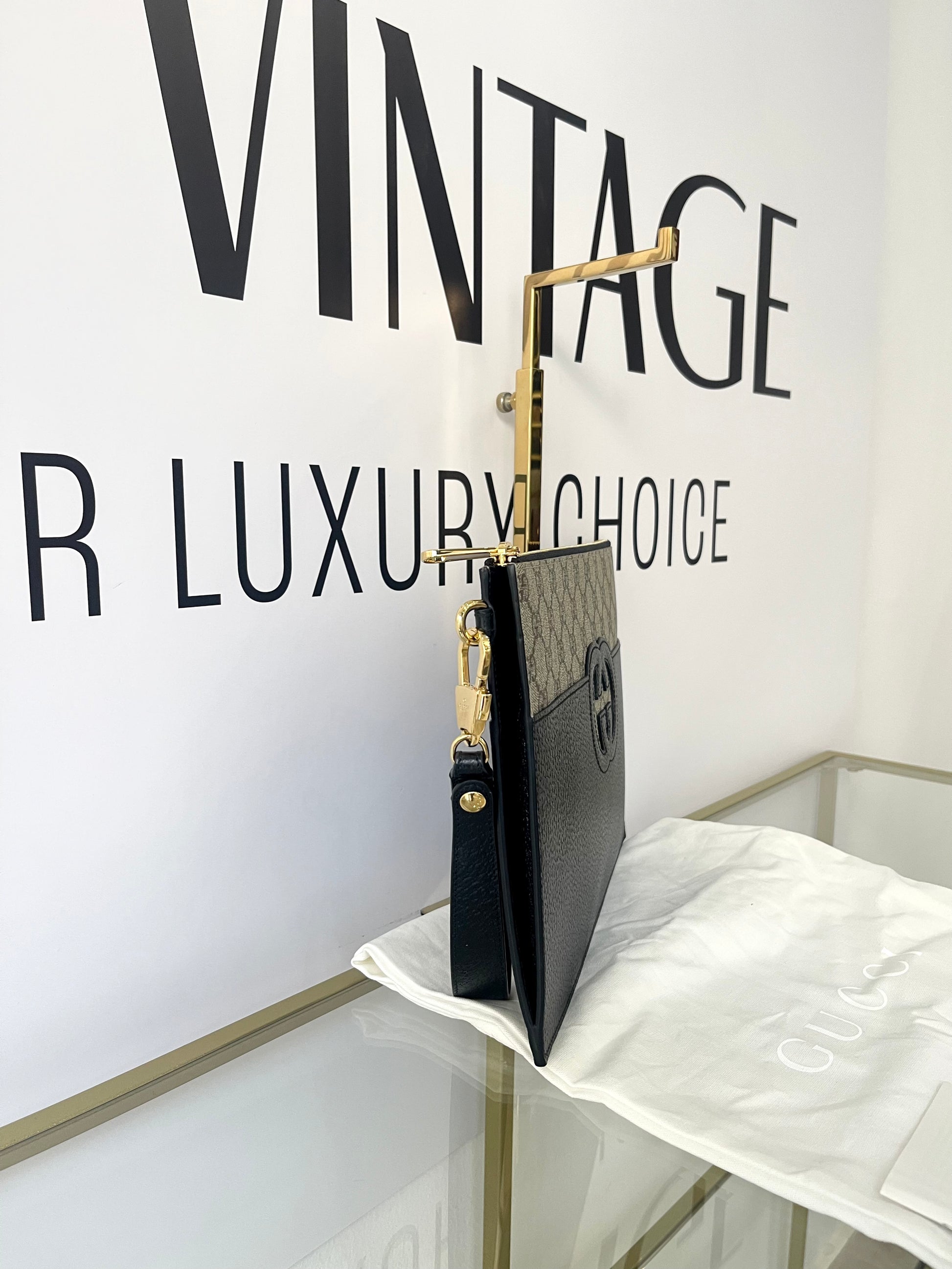 Pochette Interlocking GG Supreme Gucci