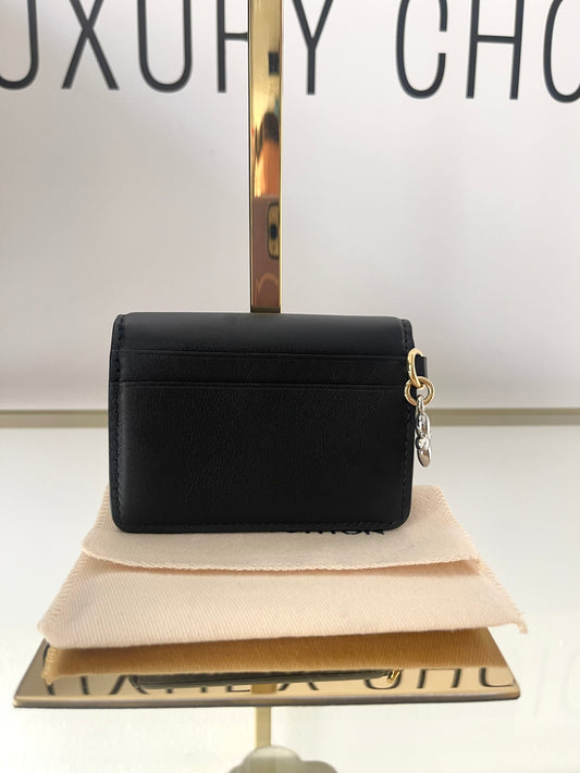 Portacarte di credito Tiny Recto Verso LV Bloom Louis Vuitton