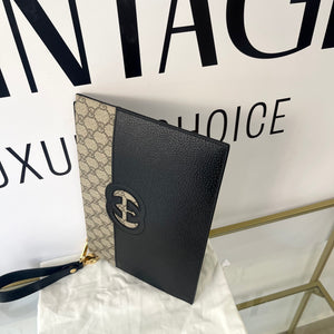 Pochette Interlocking GG Supreme Gucci