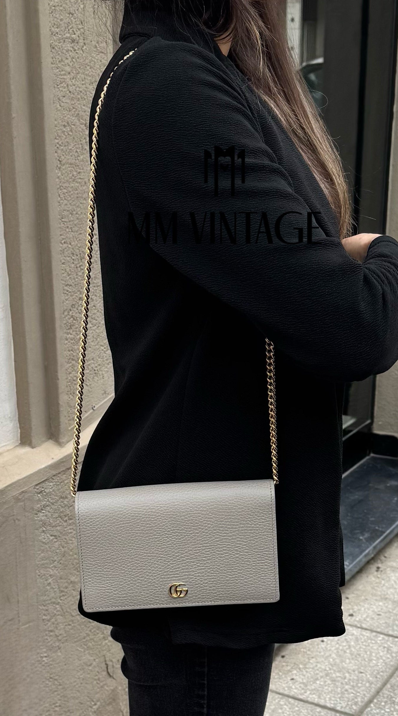 Pochette GG Marmont con catena Gucci