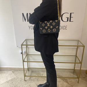 Pochette Felicie Monogram Empreinte bicolor Louis Vuitton