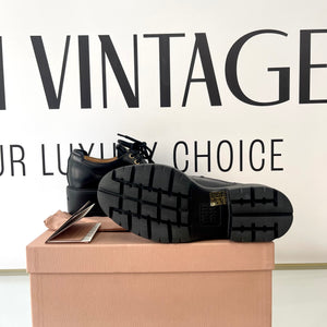 Scarpe stringate in pelle Miu Miu