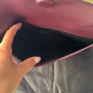 Pochette Uptown in pelle verniciata Saint Laurent