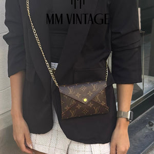 Pochette Kirigami Monogram Medium Louis Vuitton