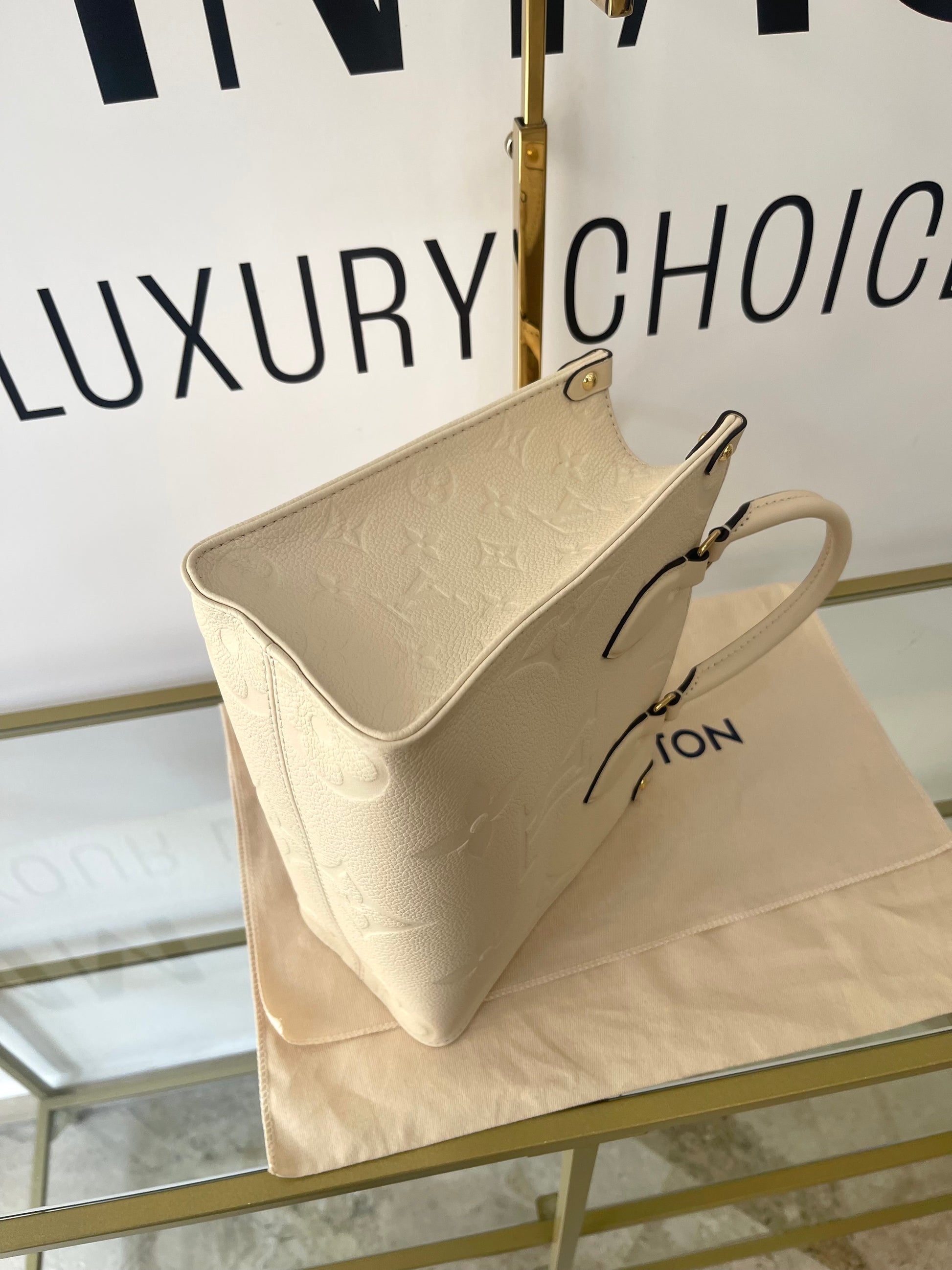 Borsa OnTheGo PM Monogram Empreinte Louis Vuitton