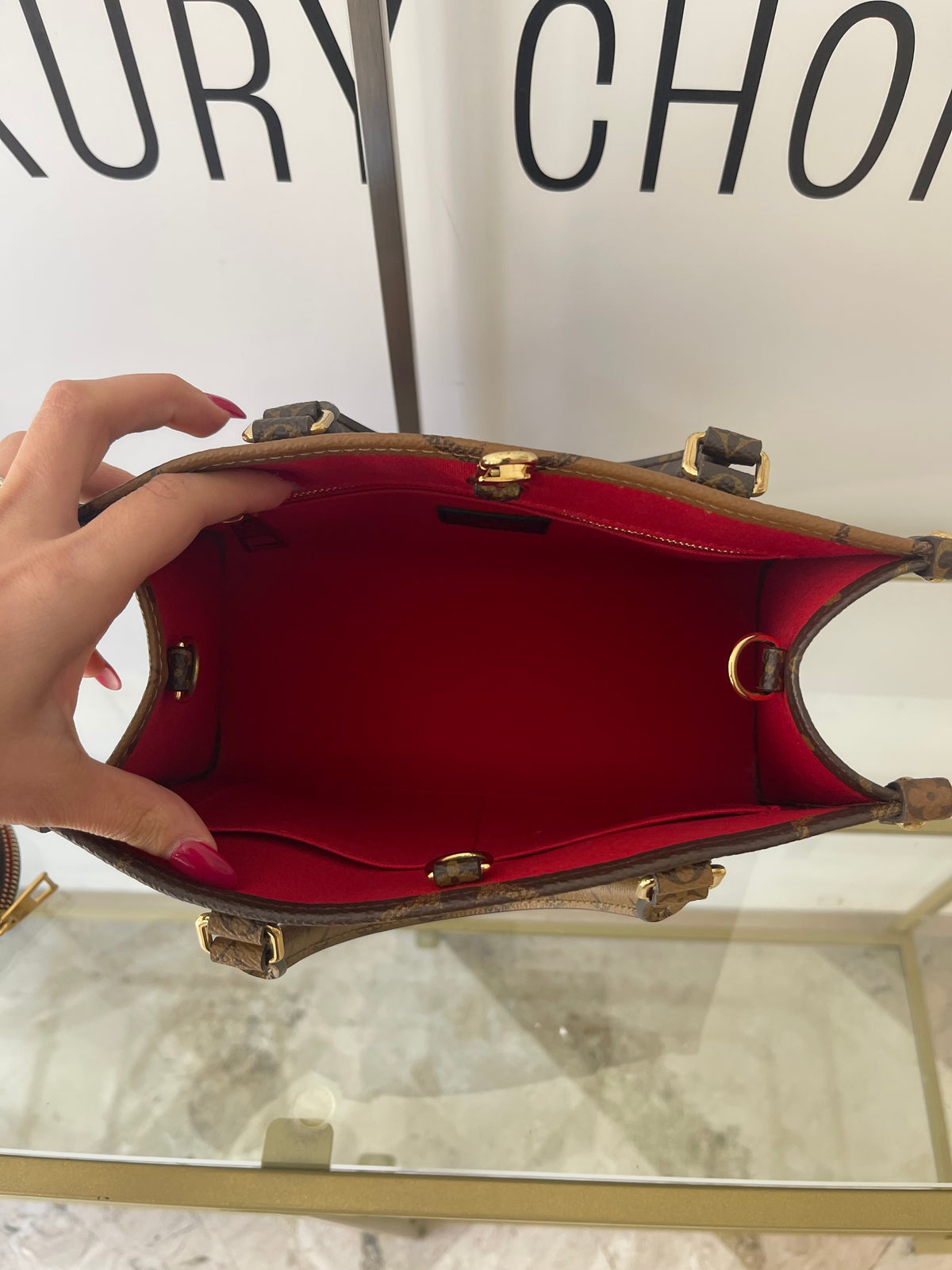 Borsa OnTheGo PM Monogram Reverse Giant Louis Vuitton