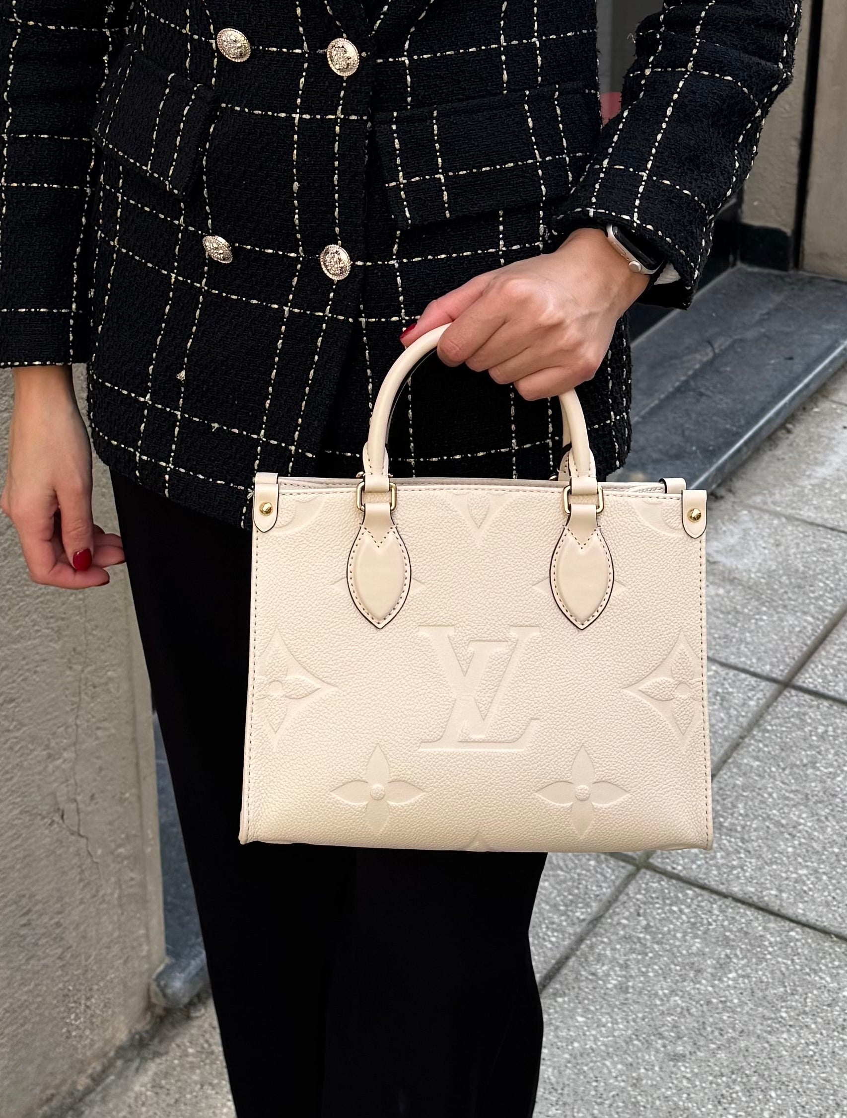 Borsa OnTheGo PM Monogram Empreinte Louis Vuitton