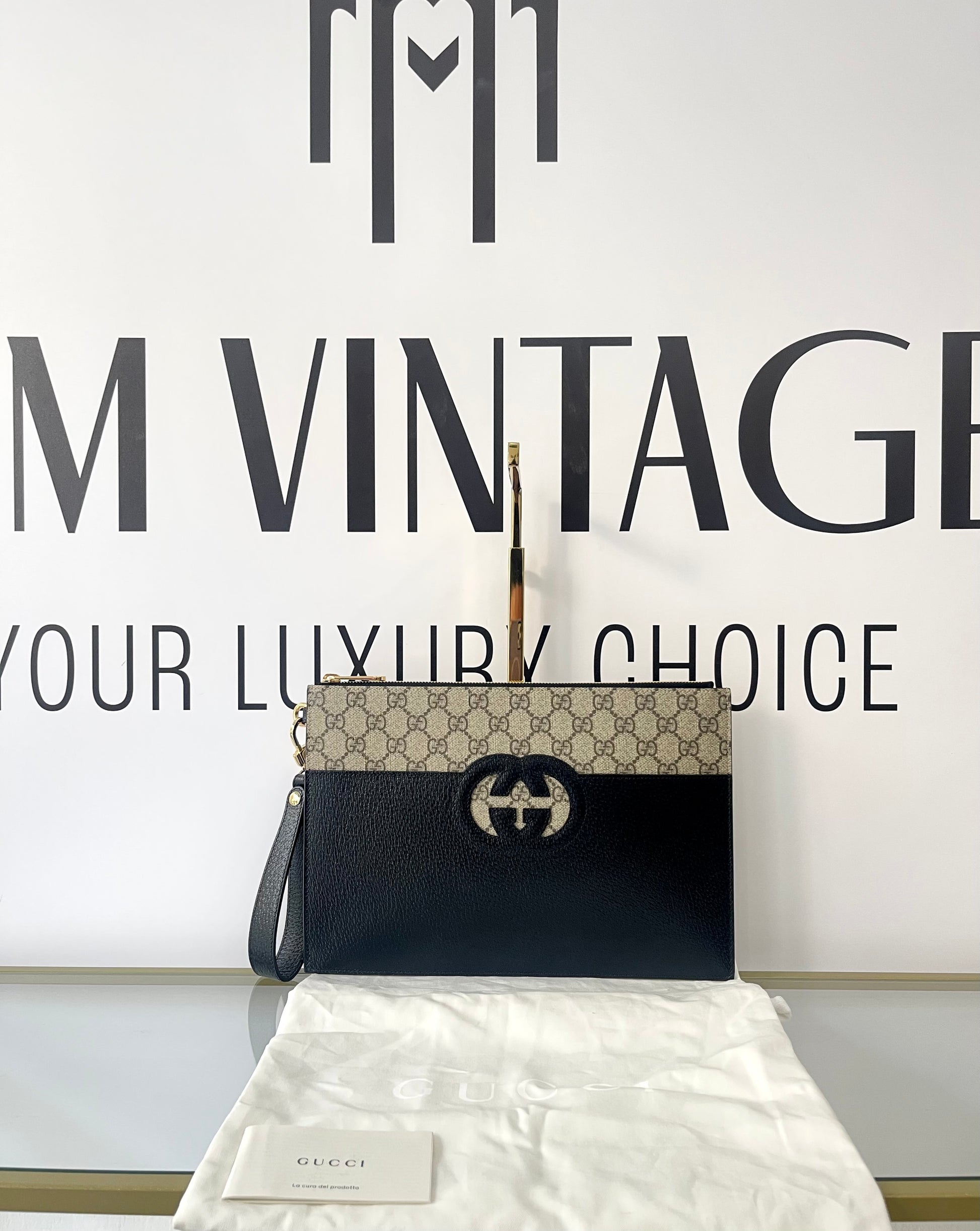 Pochette Interlocking GG Supreme Gucci