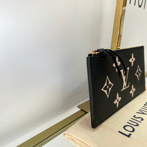 Pochette Félicie Monogram Empreinte Bicolor Louis Vuitton