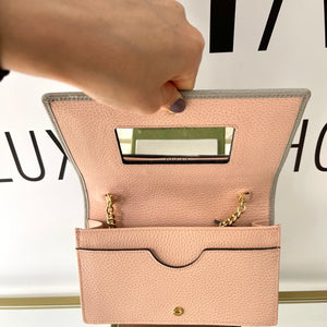 Pochette GG Marmont con catena Gucci