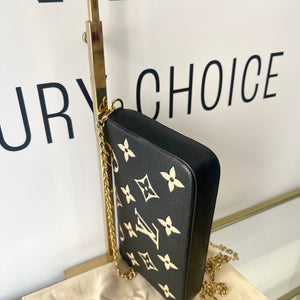 Pochette Felicie Monogram Empreinte bicolor Louis Vuitton