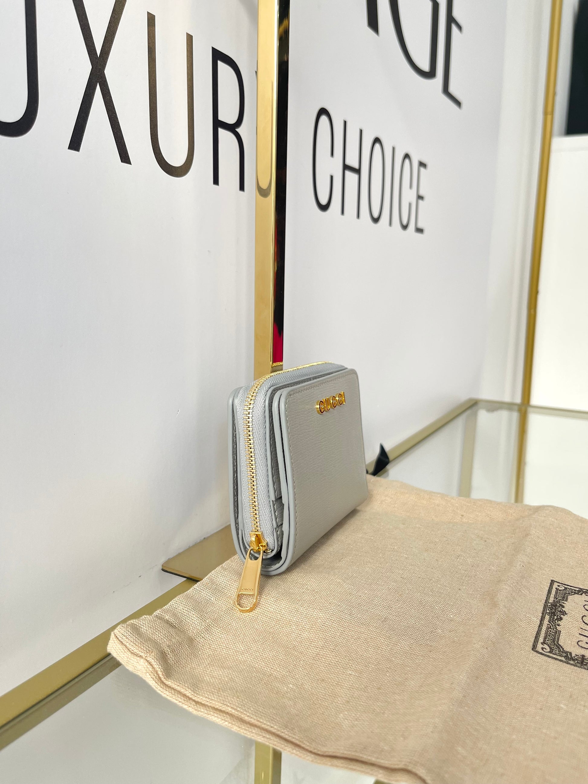 Portafoglio con logo Gucci grigio chiaro