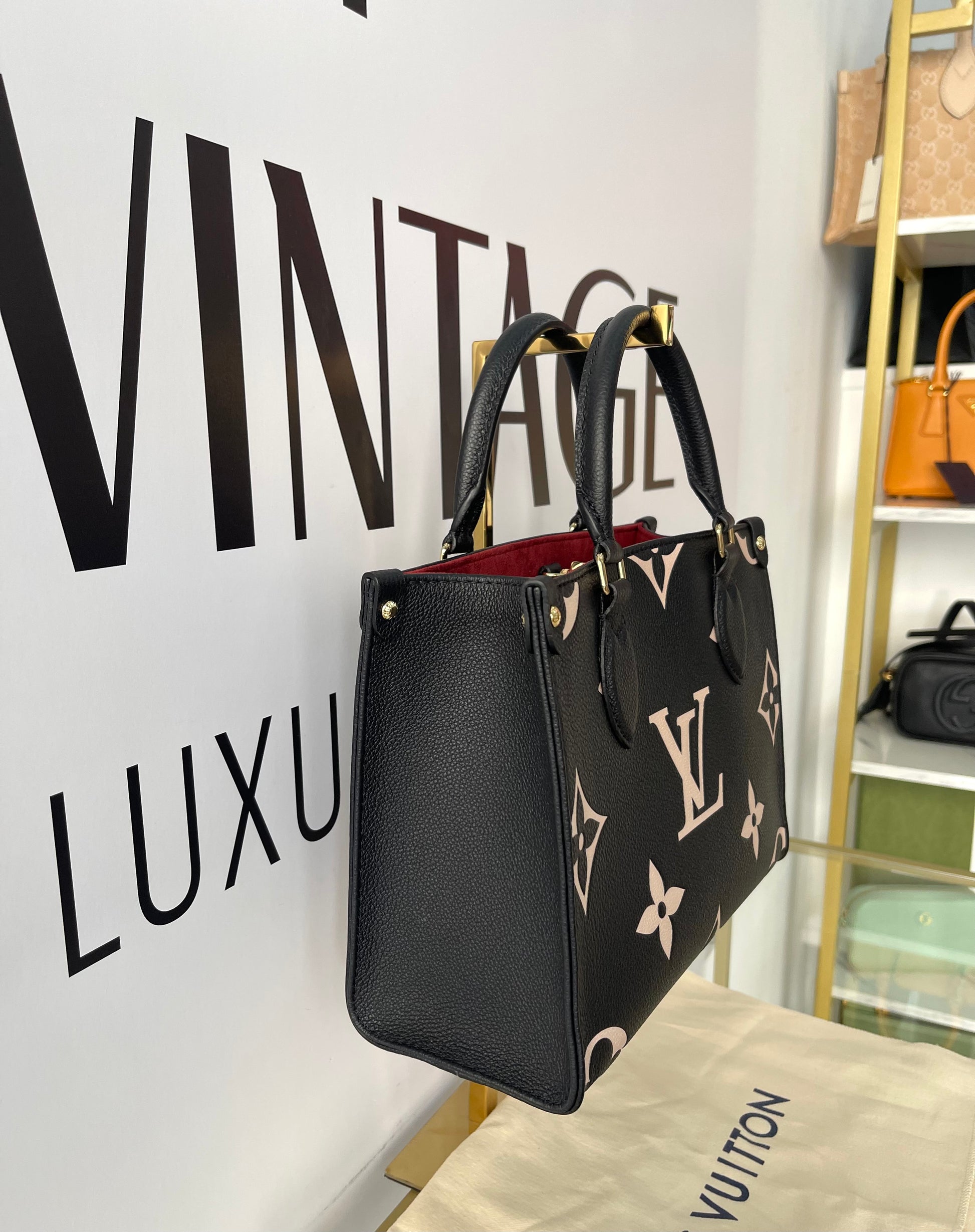 Borsa OnTheGo PM Monogram Empreinte Bicolor Louis Vuitton