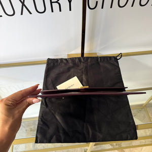 Pochette Uptown in pelle verniciata Saint Laurent