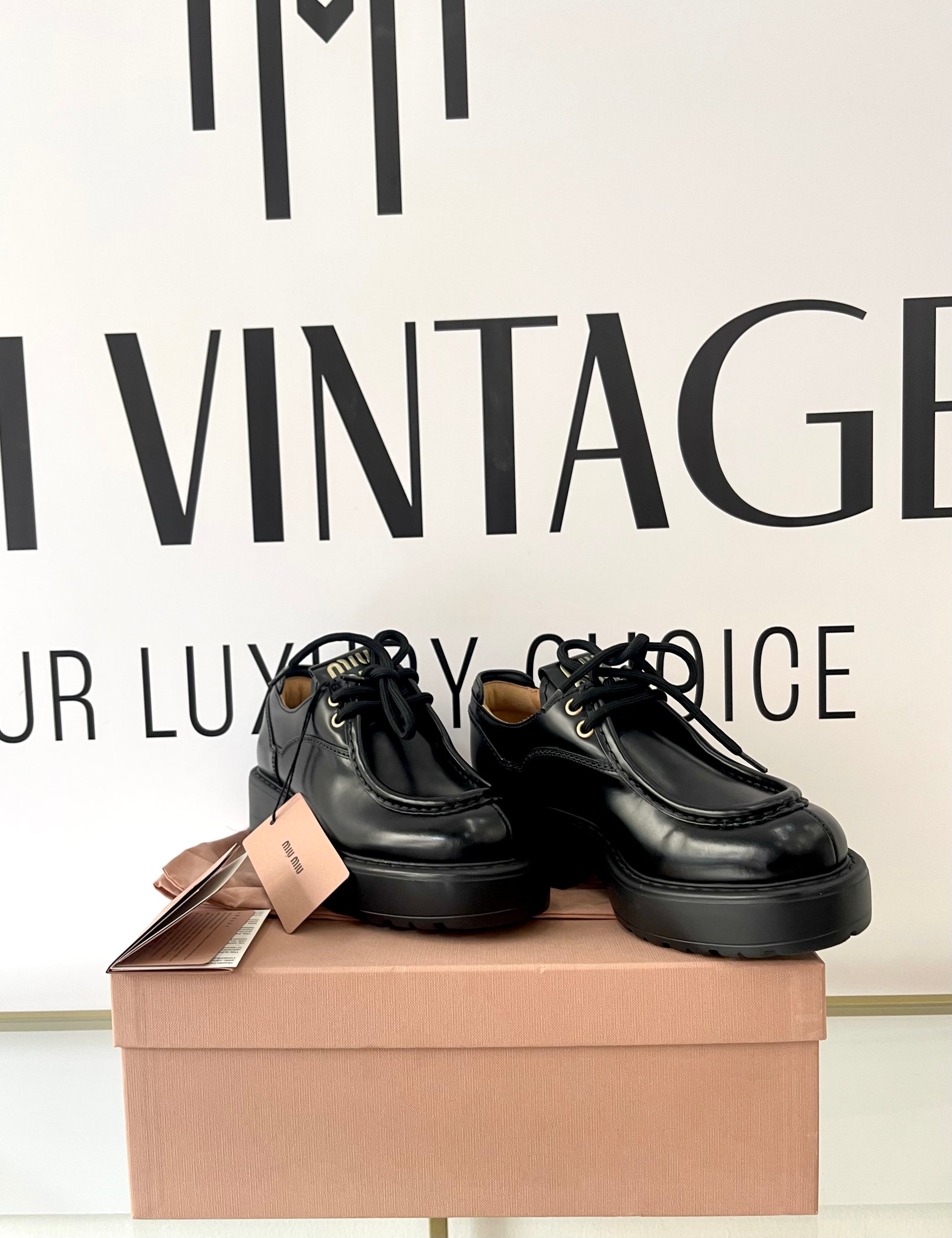 Scarpe stringate in pelle Miu Miu